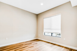 An angled view of the second bedroom from within the two-bedroom apartment unit.
